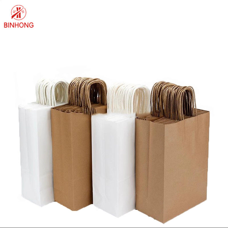 Túi giấy đứng 30cm được dán với tay cầm xoắn