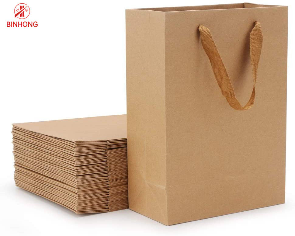 Túi giấy đứng 30cm được dán với tay cầm xoắn